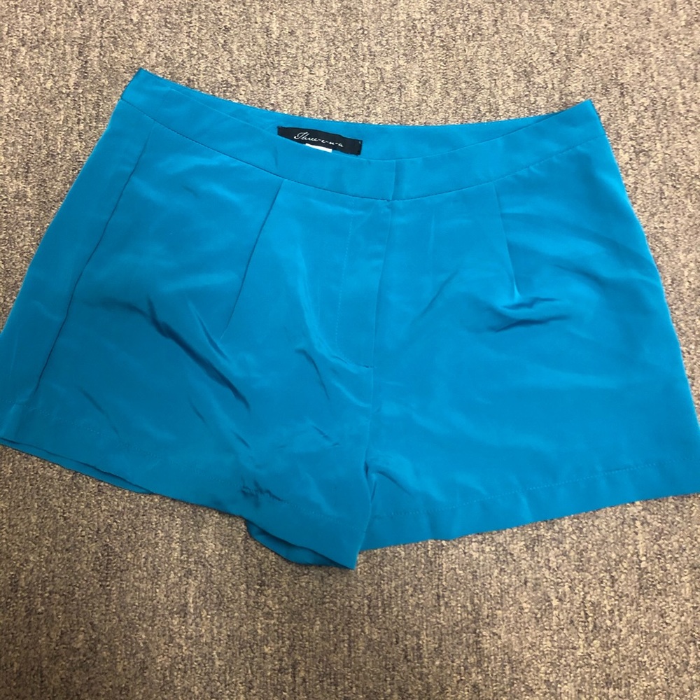 teal shorts